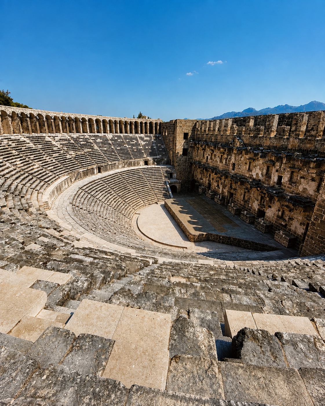 The ancient theatre at Aspendos under a clear blue sky