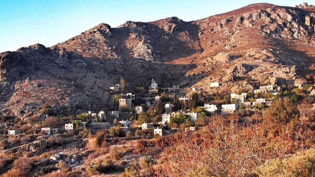 Stone houses scattered across the dry slope of Karakaya Village